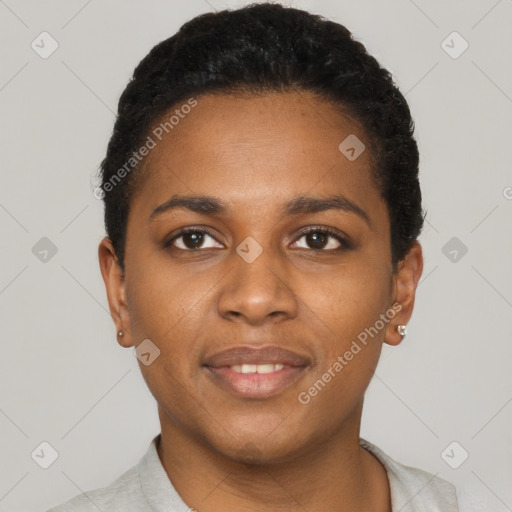 Joyful black young-adult female with short  black hair and brown eyes