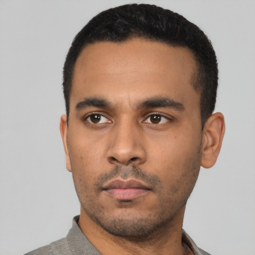 Neutral latino young-adult male with short  black hair and brown eyes