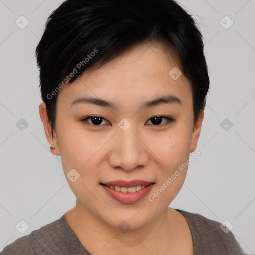 Joyful asian young-adult female with short  black hair and brown eyes