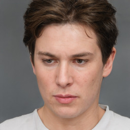 Neutral white young-adult male with short  brown hair and grey eyes