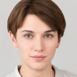 Neutral white young-adult female with short  brown hair and brown eyes