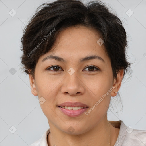 Joyful asian young-adult female with short  brown hair and brown eyes