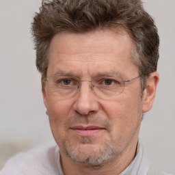 Joyful white middle-aged male with short  brown hair and brown eyes