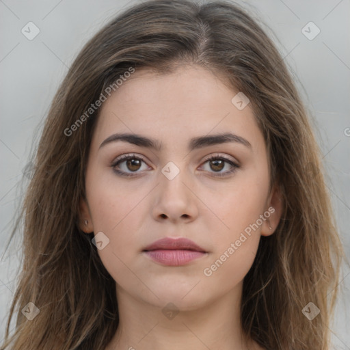 Neutral white young-adult female with long  brown hair and brown eyes