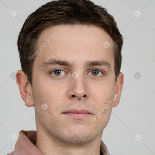 Neutral white young-adult male with short  brown hair and grey eyes