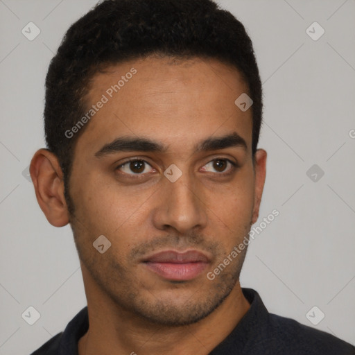 Neutral latino young-adult male with short  black hair and brown eyes