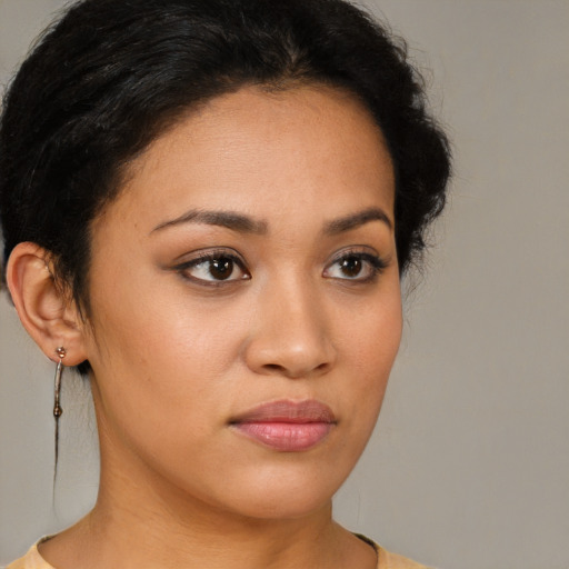 Neutral latino young-adult female with medium  brown hair and brown eyes