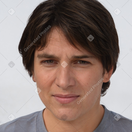 Joyful white adult female with short  brown hair and brown eyes