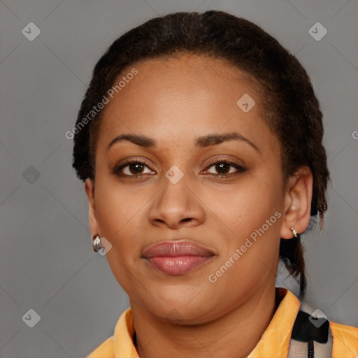 Joyful latino young-adult female with short  brown hair and brown eyes