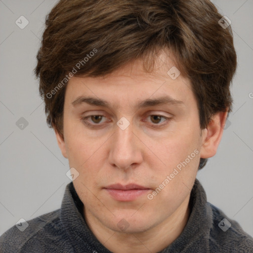 Neutral white adult male with short  brown hair and grey eyes