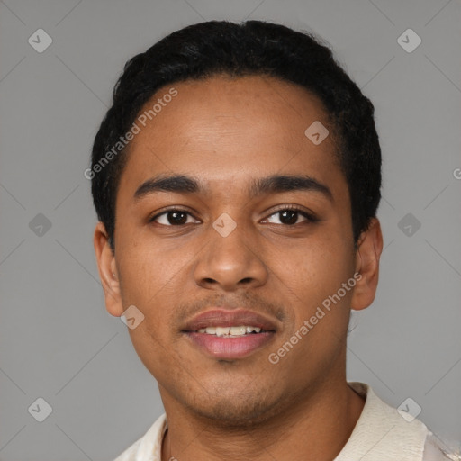 Joyful latino young-adult male with short  black hair and brown eyes