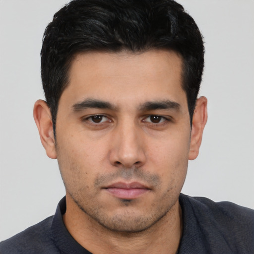Neutral white young-adult male with short  black hair and brown eyes
