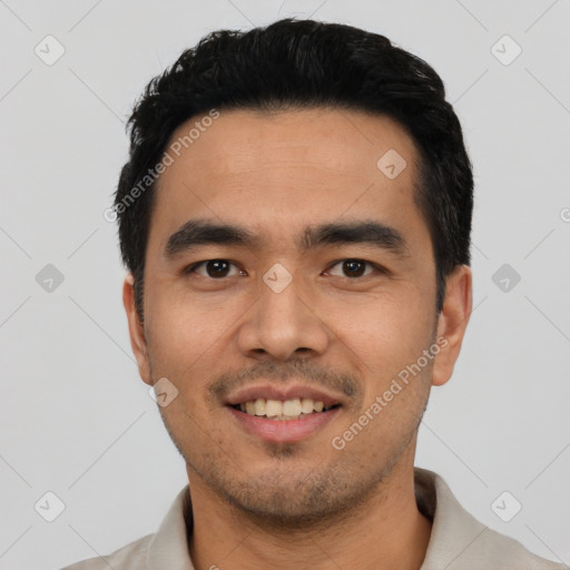 Joyful asian young-adult male with short  black hair and brown eyes