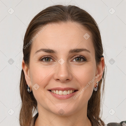 Joyful white young-adult female with medium  brown hair and grey eyes