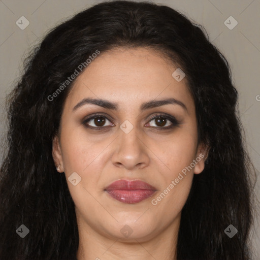 Joyful latino young-adult female with long  brown hair and brown eyes