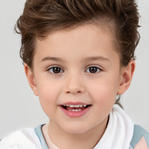 Joyful white child male with short  brown hair and brown eyes