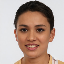 Joyful latino young-adult female with short  brown hair and brown eyes