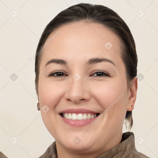 Joyful white young-adult female with medium  brown hair and brown eyes