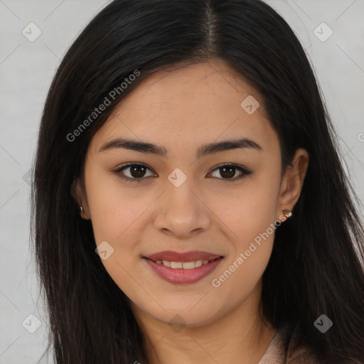 Joyful asian young-adult female with long  brown hair and brown eyes