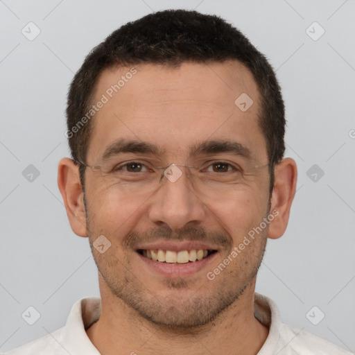 Joyful white adult male with short  brown hair and brown eyes