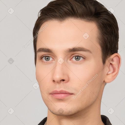 Neutral white young-adult male with short  brown hair and brown eyes