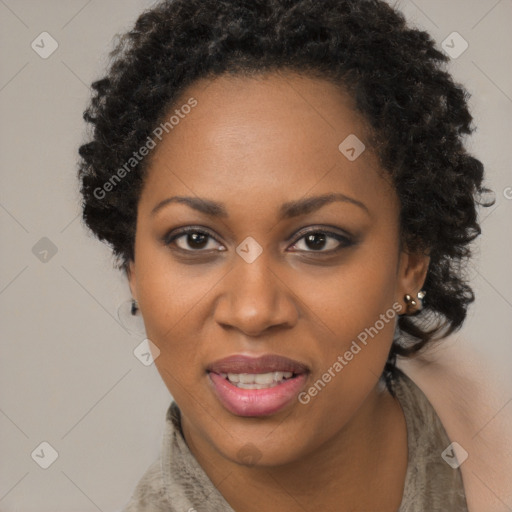 Joyful black adult female with short  brown hair and brown eyes