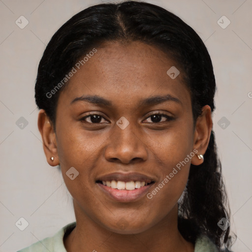 Joyful latino young-adult female with short  black hair and brown eyes