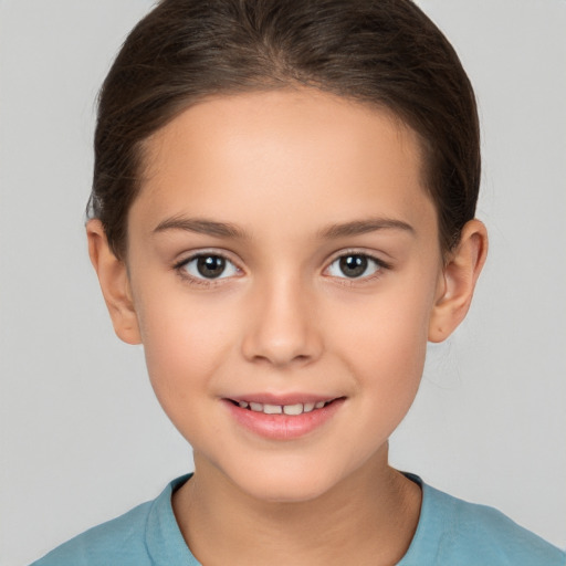 Joyful white child female with medium  brown hair and brown eyes