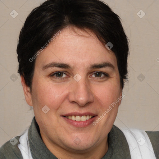 Joyful white adult female with medium  brown hair and brown eyes