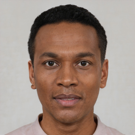 Neutral black young-adult male with short  black hair and brown eyes