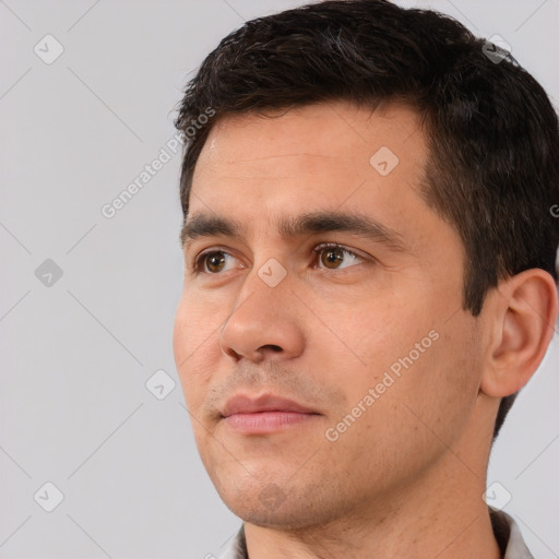 Neutral white young-adult male with short  brown hair and brown eyes