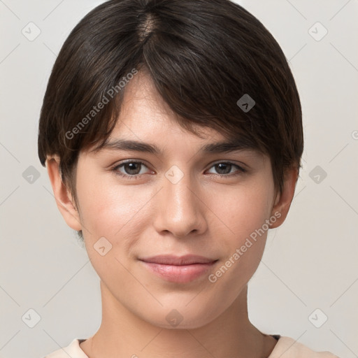 Joyful white young-adult female with short  brown hair and brown eyes