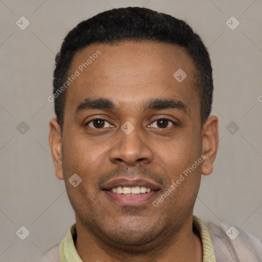 Joyful latino young-adult male with short  black hair and brown eyes