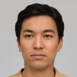 Neutral asian young-adult male with short  brown hair and brown eyes