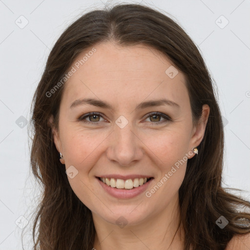 Joyful white young-adult female with long  brown hair and grey eyes