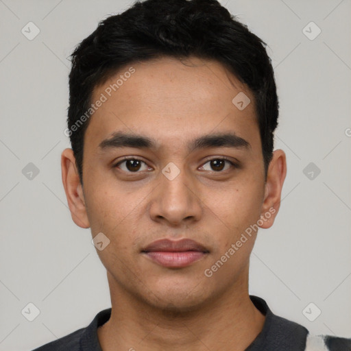 Neutral latino young-adult male with short  black hair and brown eyes