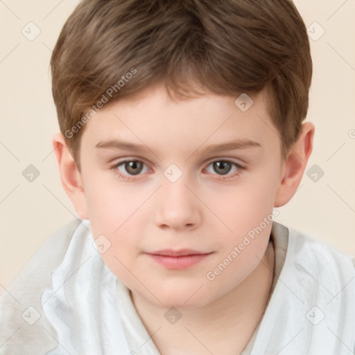 Joyful white child male with short  brown hair and brown eyes