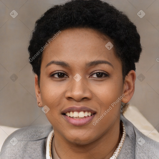 Joyful black young-adult female with short  black hair and brown eyes