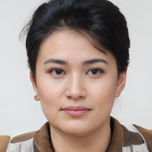 Neutral asian young-adult female with medium  brown hair and brown eyes