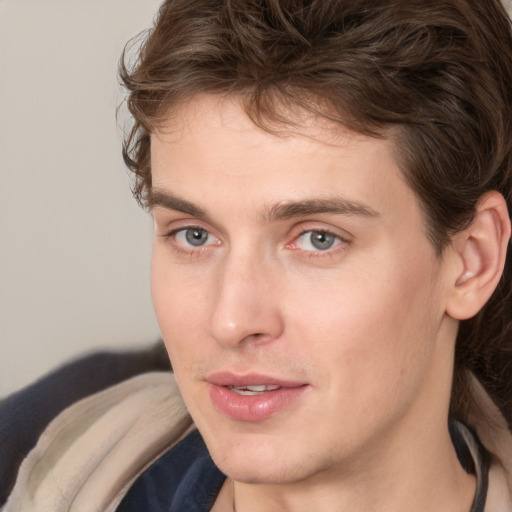 Neutral white young-adult male with medium  brown hair and brown eyes