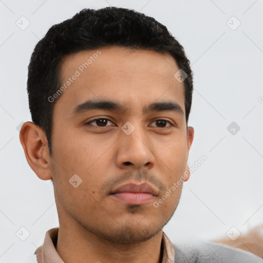 Neutral latino young-adult male with short  black hair and brown eyes