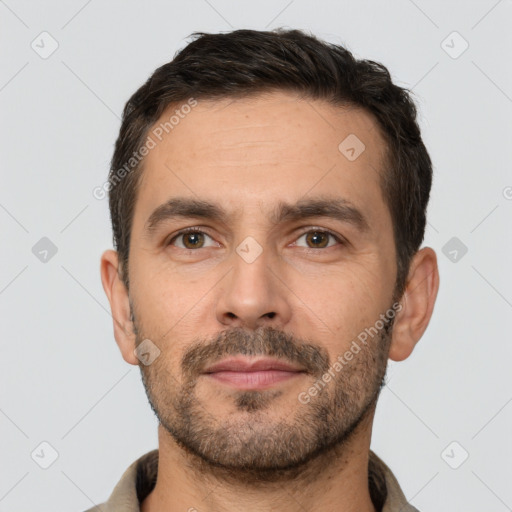 Neutral white adult male with short  brown hair and brown eyes