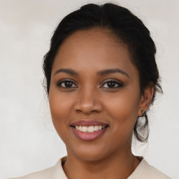 Joyful latino young-adult female with medium  black hair and brown eyes