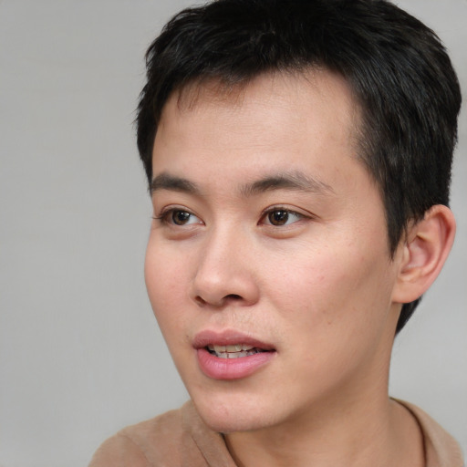Neutral white young-adult male with short  black hair and brown eyes