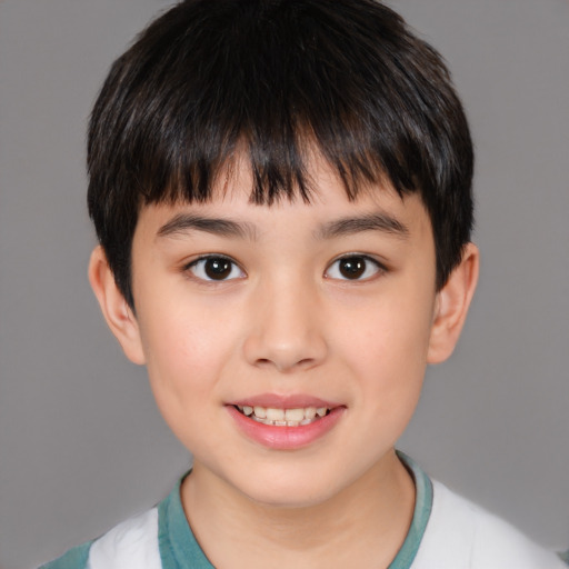 Joyful white child male with short  brown hair and brown eyes