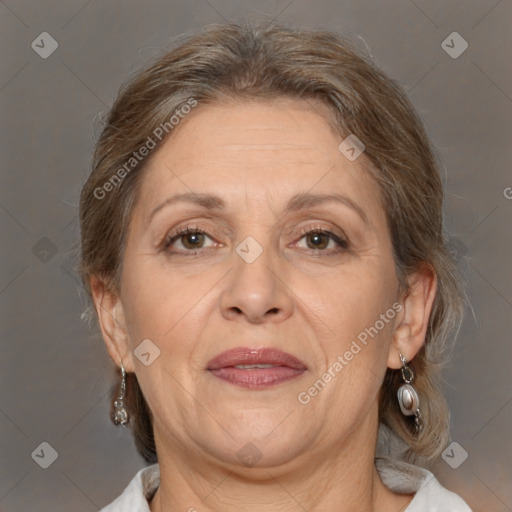 Joyful white adult female with medium  brown hair and brown eyes