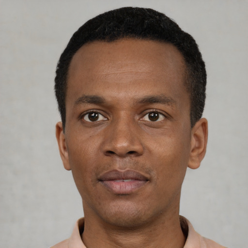 Neutral black young-adult male with short  black hair and brown eyes