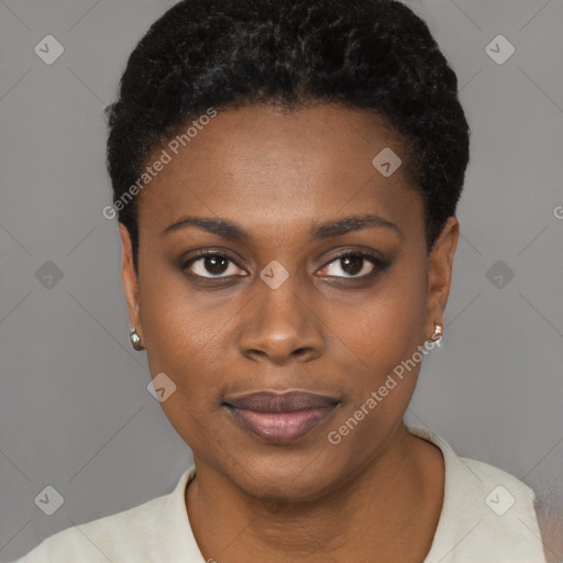 Joyful black young-adult female with short  black hair and brown eyes