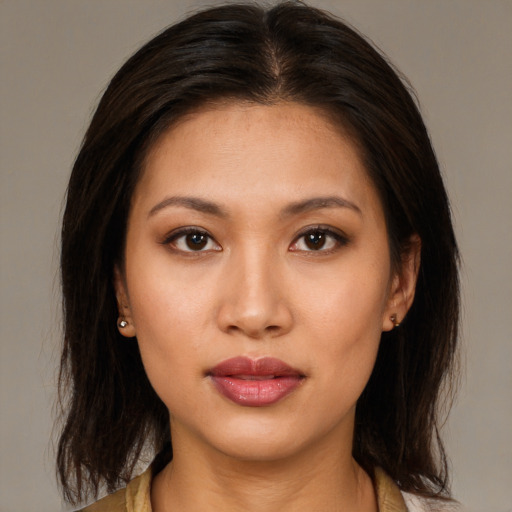 Neutral asian young-adult female with medium  brown hair and brown eyes