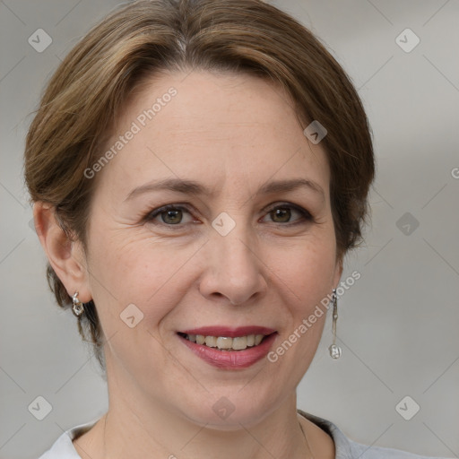 Joyful white adult female with medium  brown hair and grey eyes